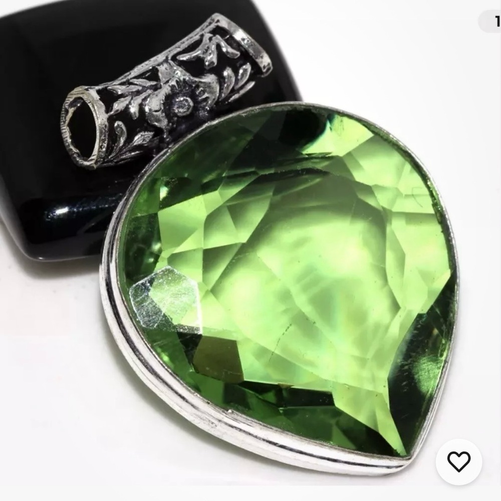 Absolutely Beautiful Peridot Heart Set in Solid Peridot.